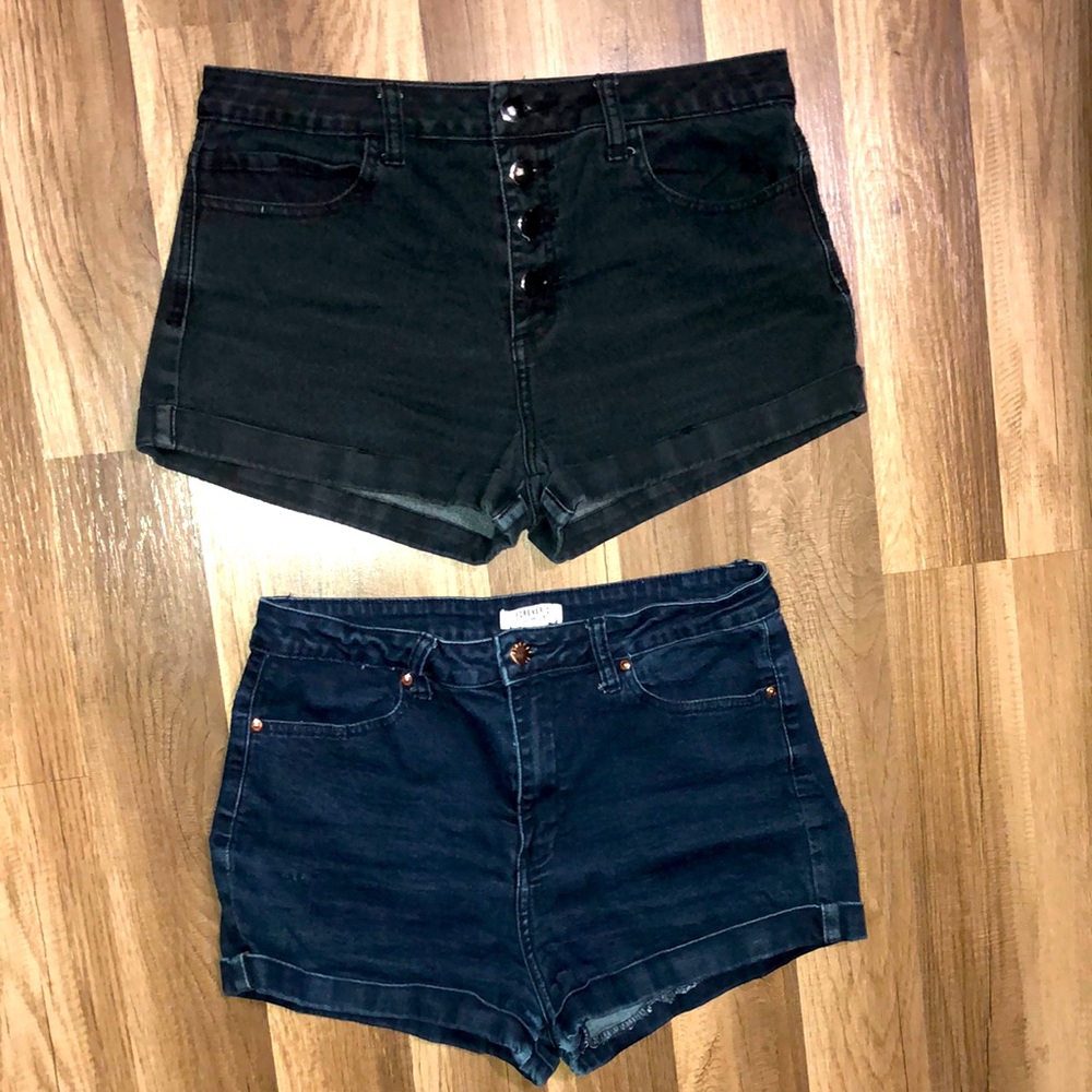 Size 30 shorts. Selling as a set. Forever21 one dark blue jean one black jean